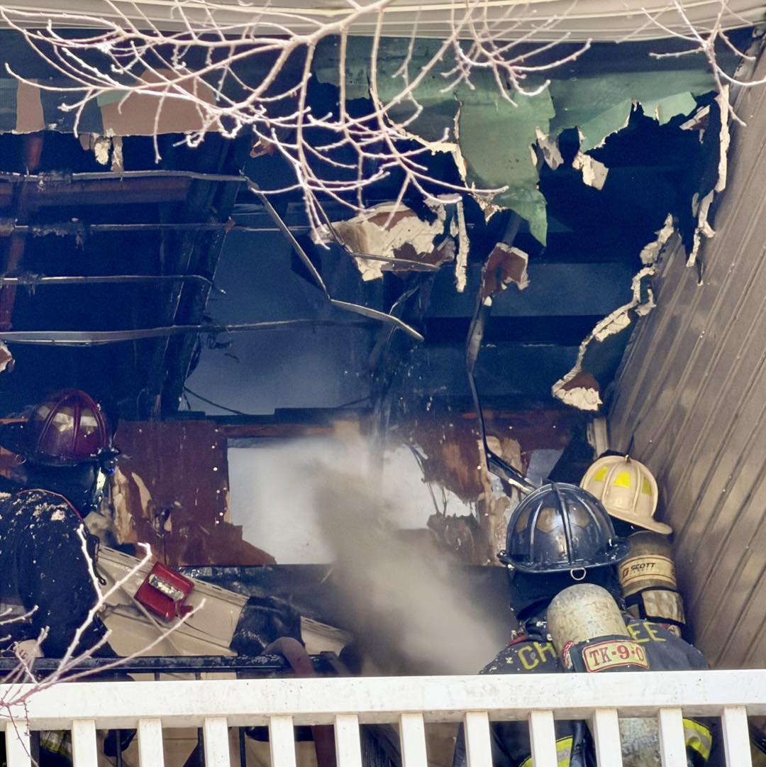 Firefighters work to extinguish the fire.